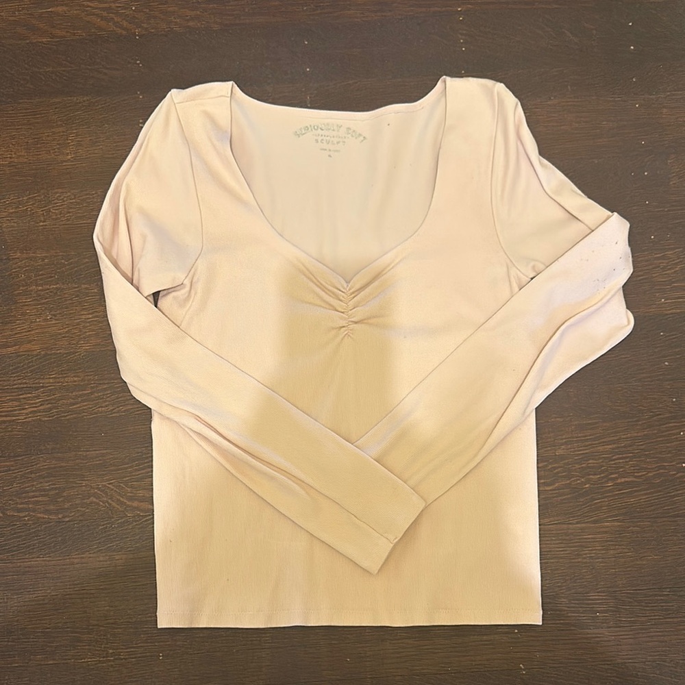 Thick light pink long sleeved top top